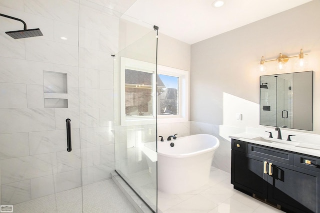 bathroom featuring shower with separate bathtub, vanity, and tile walls