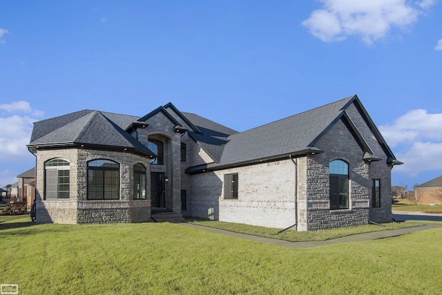 view of front of home with a front yard