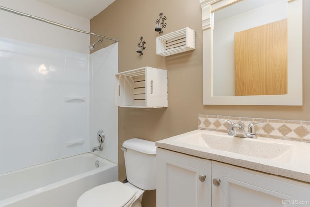 full bathroom with shower / washtub combination, vanity, and toilet