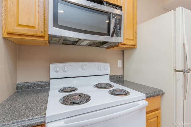 kitchen featuring white appliances