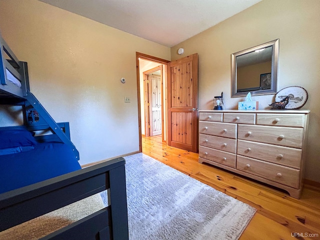 bedroom featuring hardwood / wood-style floors