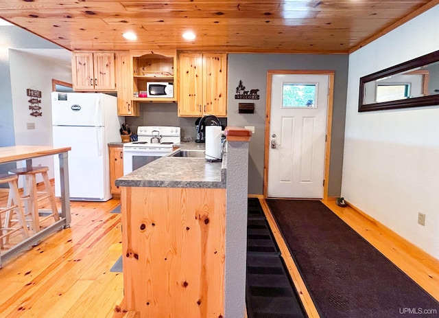 kitchen featuring light brown cabinets, white appliances, sink, light hardwood / wood-style floors, and wood ceiling