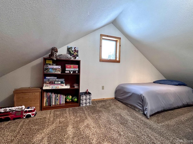 carpeted bedroom featuring lofted ceiling and a textured ceiling