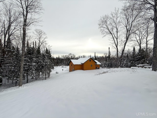 view of yard covered in snow