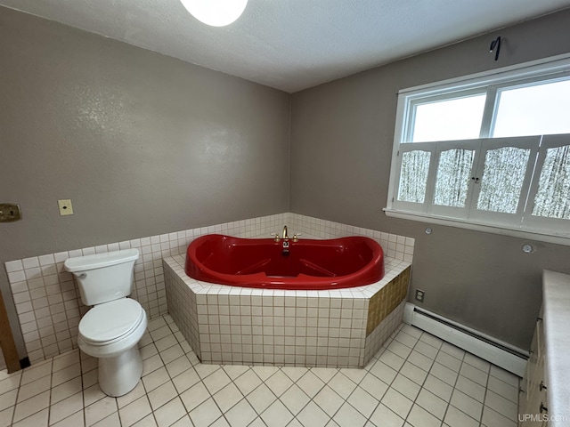 bathroom with a tub to relax in, tile patterned floors, a textured ceiling, a baseboard heating unit, and toilet