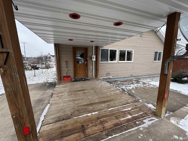 view of snow covered deck