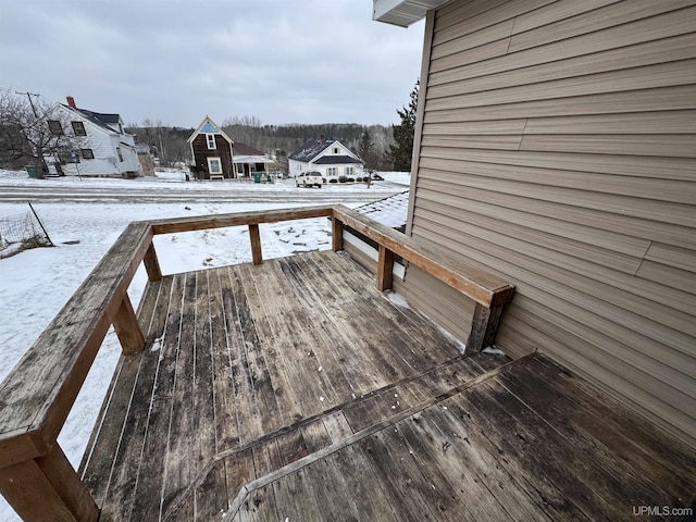 view of snow covered deck