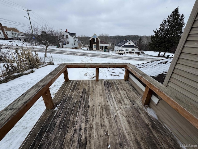 view of snow covered deck