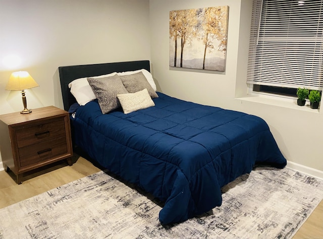 bedroom featuring light hardwood / wood-style flooring