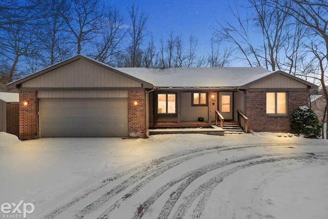 ranch-style house featuring a garage