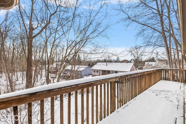 view of snow covered deck