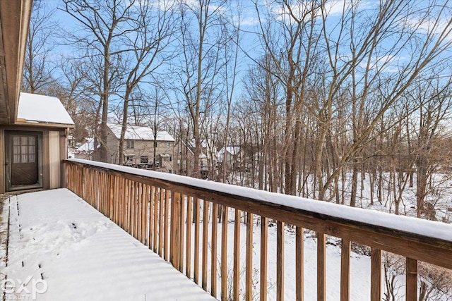 view of snow covered deck