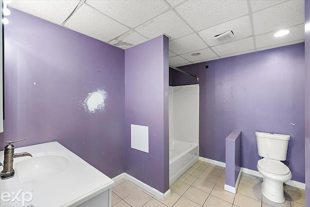 bathroom with tile patterned floors, sink, and toilet