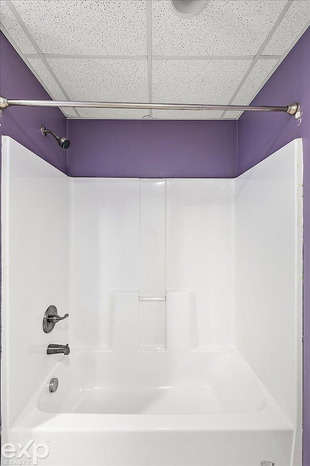 bathroom featuring washtub / shower combination