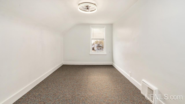 bonus room featuring carpet floors and lofted ceiling