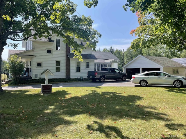 view of side of property featuring a yard