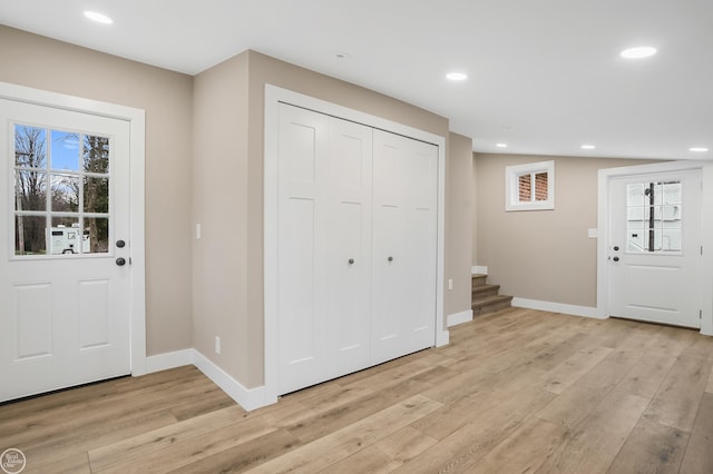 foyer entrance featuring light wood-type flooring