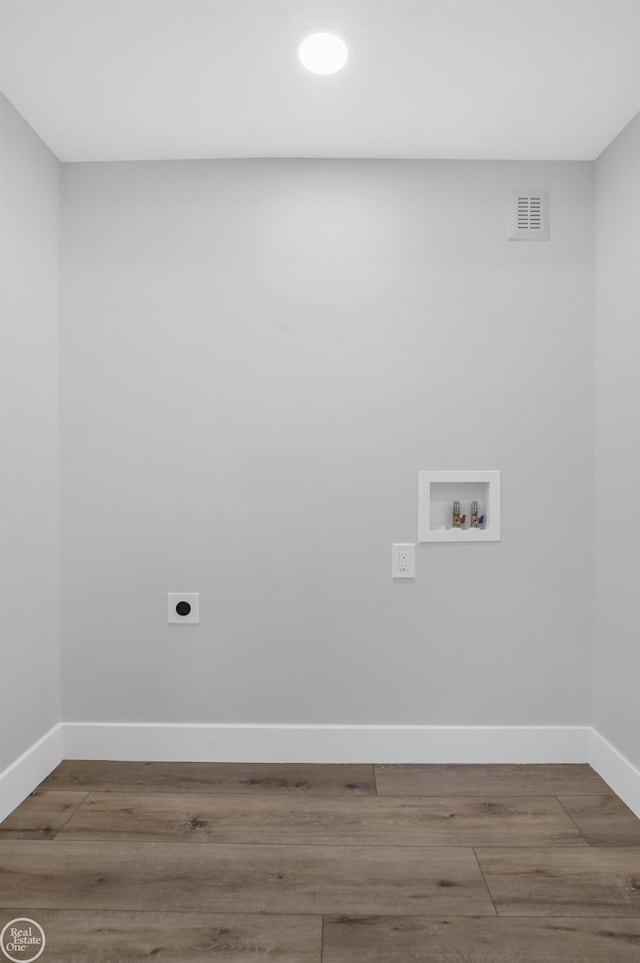 laundry area featuring hookup for a washing machine, wood-type flooring, and hookup for an electric dryer