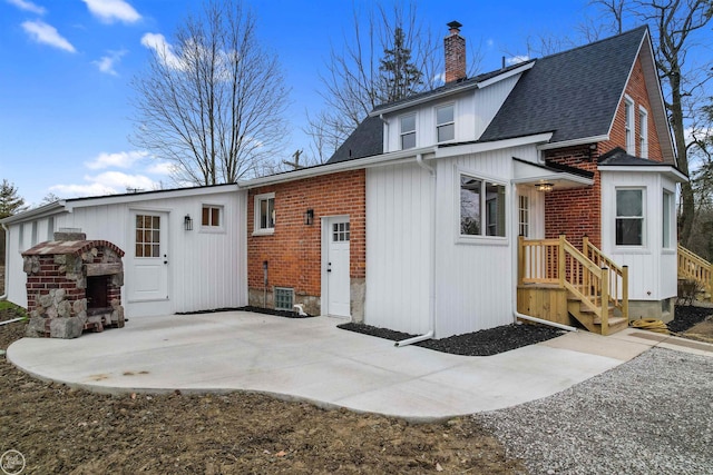 rear view of house featuring a patio area