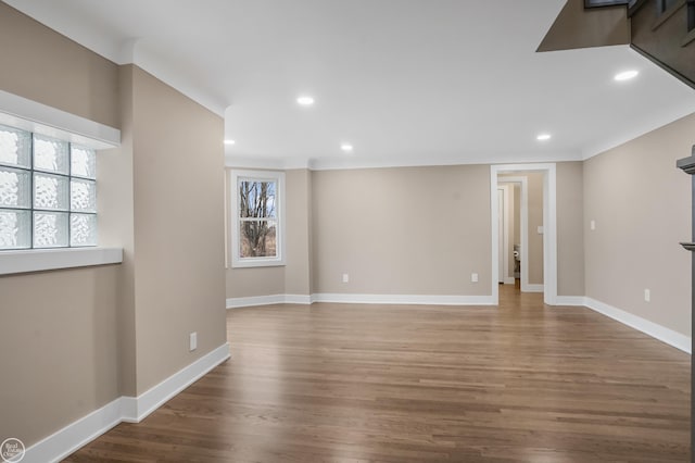 empty room with wood-type flooring