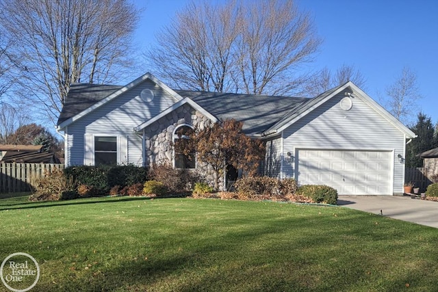 ranch-style home featuring a garage and a front yard