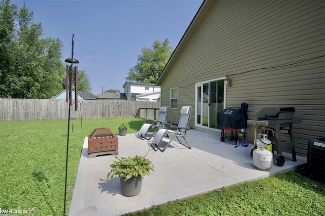 view of patio featuring grilling area and central air condition unit