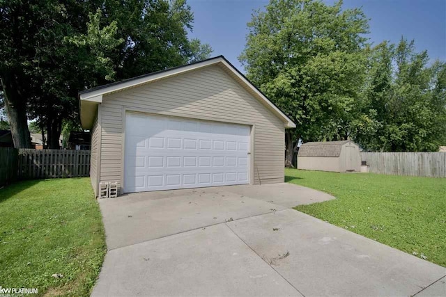 garage featuring a yard