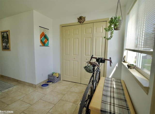 interior space with light tile patterned floors