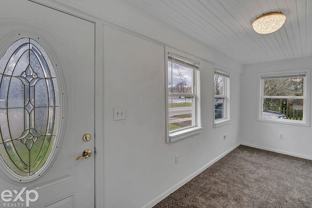 entryway featuring carpet flooring