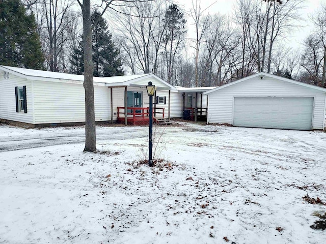 view of front of house featuring a porch and a garage