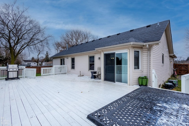 wooden deck featuring grilling area