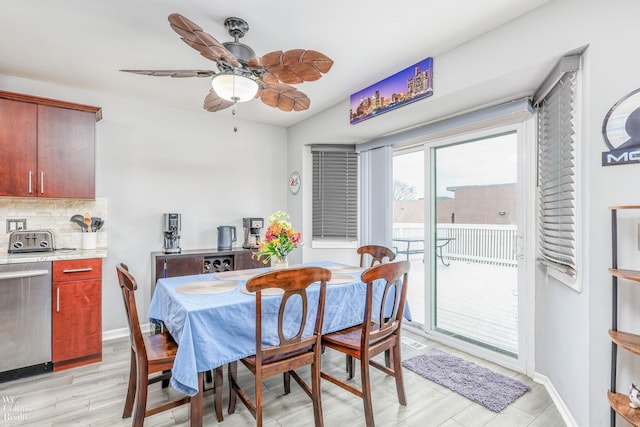 dining space featuring ceiling fan and light hardwood / wood-style flooring