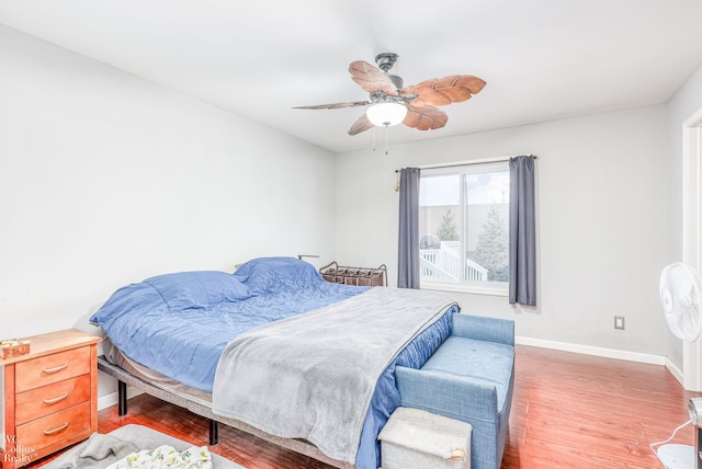 bedroom featuring ceiling fan and wood-type flooring