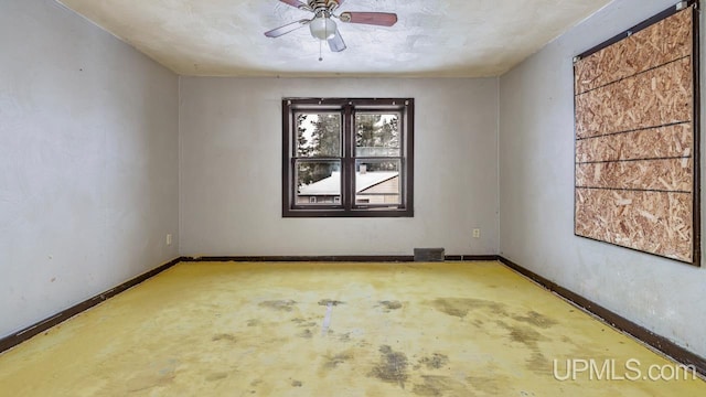 empty room with ceiling fan