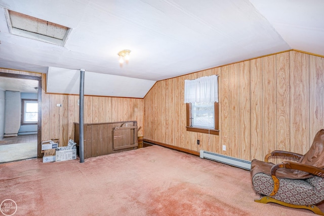 bonus room featuring carpet, vaulted ceiling, and a baseboard heating unit