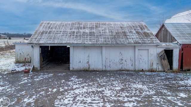 view of snow covered garage