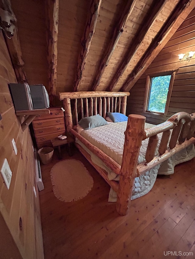 bedroom featuring wood-type flooring, lofted ceiling with beams, wood walls, and wood ceiling