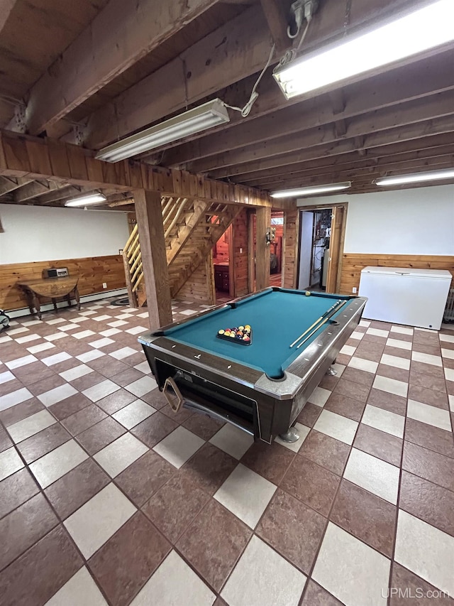 recreation room featuring pool table and wooden walls