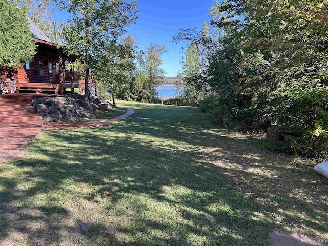 view of yard with a deck