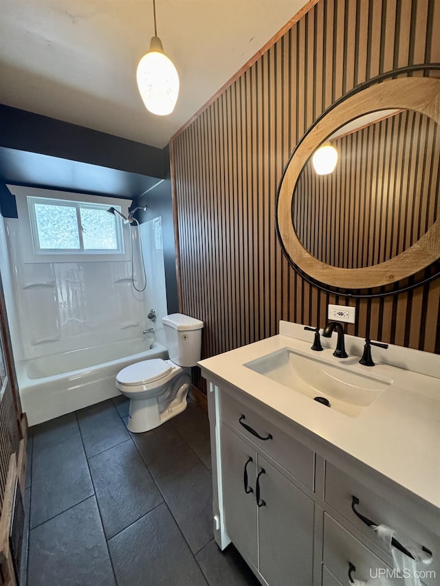 full bathroom featuring vanity, toilet, shower / washtub combination, and tile patterned floors