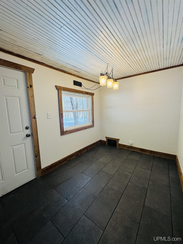 empty room with wooden ceiling, an inviting chandelier, and ornamental molding