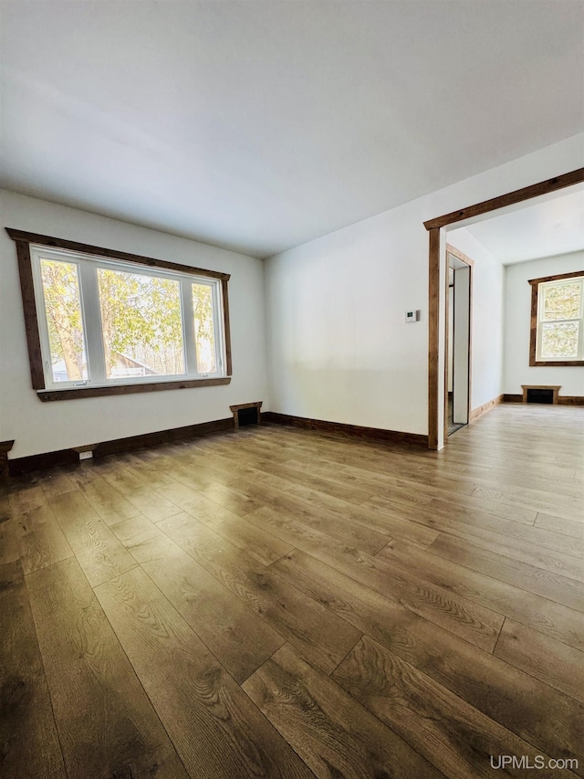 empty room featuring wood-type flooring