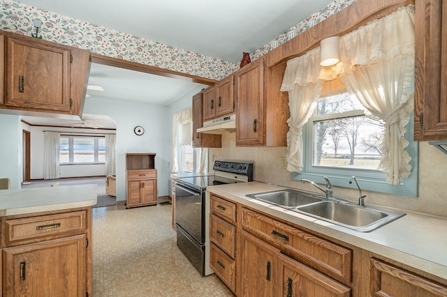 kitchen featuring sink and black electric range