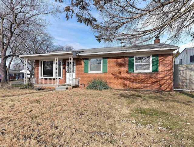 ranch-style house with a front lawn