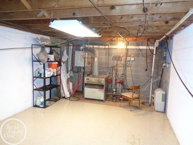 basement featuring water heater