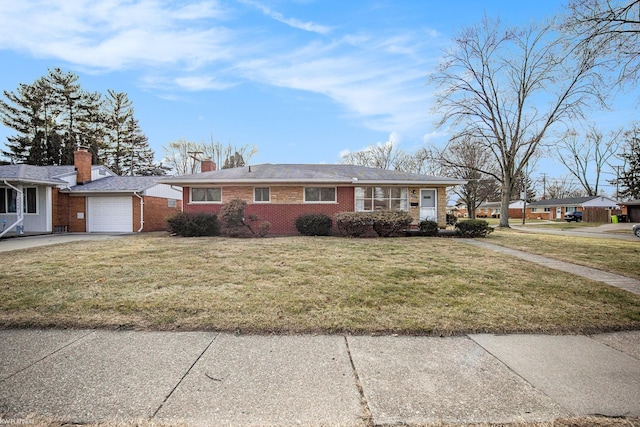 ranch-style house with a front yard and a garage