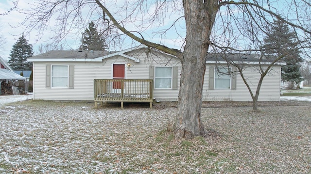 view of front of house with a wooden deck