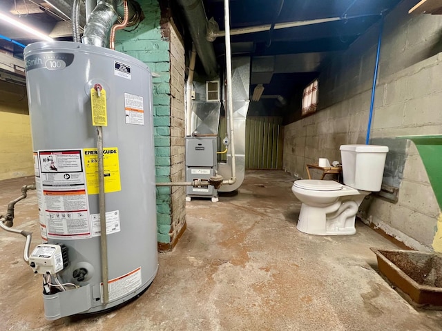 utility room featuring heating unit and gas water heater