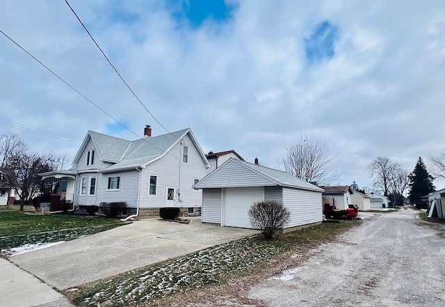 view of property exterior with a garage