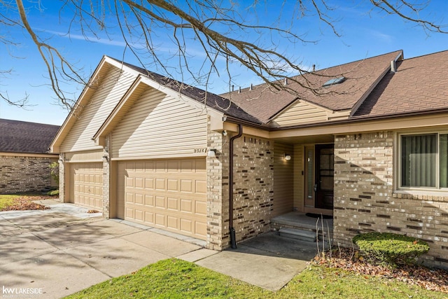 single story home with a garage